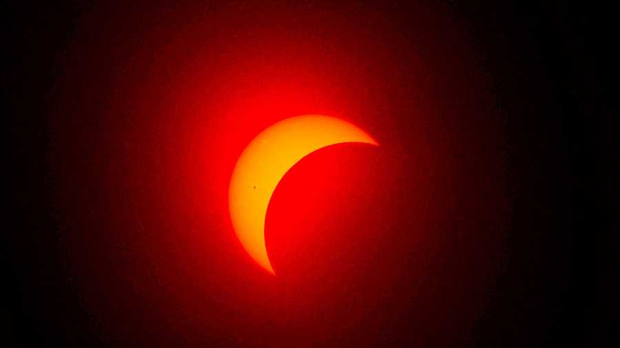 FORT WORTH, TEXAS - APRIL 8: The moon eclipses the sun on April 8, 2024 in Fort Worth, Texas. Millions of people have flocked to areas across North America that are in the "path of totality" in order to experience a total solar eclipse. During the event, the moon will pass in between the sun and the Earth, appearing to block the sun. (Photo by Ron Jenkins/Getty Images) FORT WORTH, TEXAS - APRIL 8: The moon eclipses the sun on April 8, 2024 in Fort Worth, Texas. Millions of people have flocked to areas across North America that are in the "path of totality" in order to experience a total solar eclipse. During the event, the moon will pass in between the sun and the Earth, appearing to block the sun. (Photo by Ron Jenkins/Getty Images)