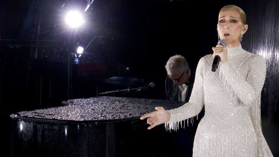 Opening Ceremony - Olympic Games Paris 2024: Day 0 PARIS, FRANCE - JULY 26: (EDITOR'S NOTE: This Handout screengrab was provided by a third-party organization and may not adhere to Getty Images' editorial policy.) This handout released by the Olympic Broadcasting Services, shows a view of singer Celine Dion performing on the Eiffel Tower during the opening ceremony of the Paris 2024 Olympic Games Paris 2024 on July 26, 2024 in Paris, France. (Screengrab by IOC via Getty Images)