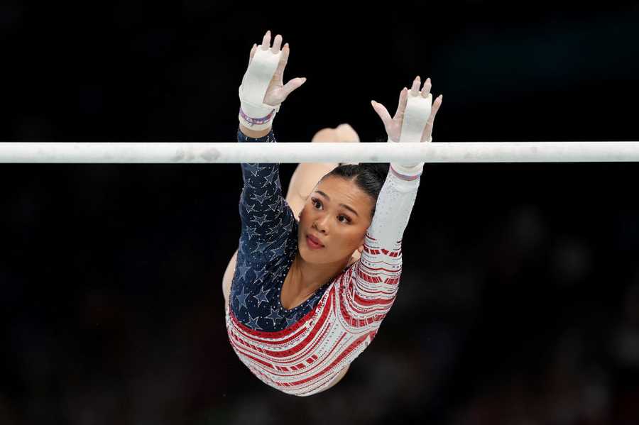 Artistic Gymnastics - Olympic Games Paris 2024: Day 4 PARIS, FRANCE - JULY 30: Sunisa Lee of Team United States competes on the uneven bars during the Artistic Gymnastics Women's Team Final on day four of the Olympic Games Paris 2024 at Bercy Arena on July 30, 2024 in Paris, France. (Photo by Jamie Squire/Getty Images)